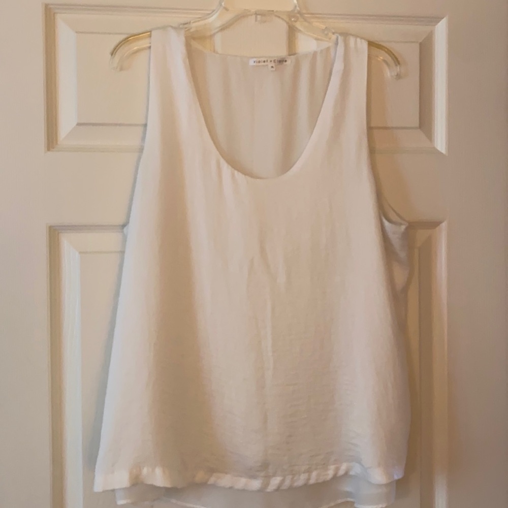 Sleeveless White Blouse